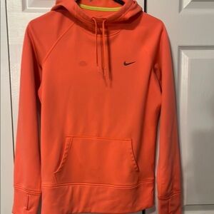 NIKE Thermo fit hoodie with finger holes in the sleeves.